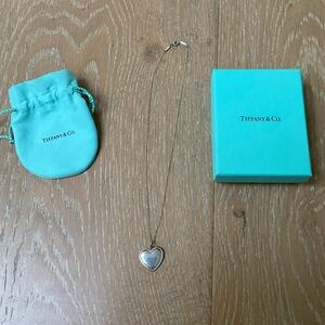 Tiffany and Co silver heart charm necklace.